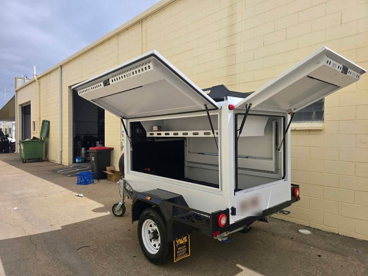 Pandanus toolbox canopy trailer with both gullwing doors open outside the TWB workshop